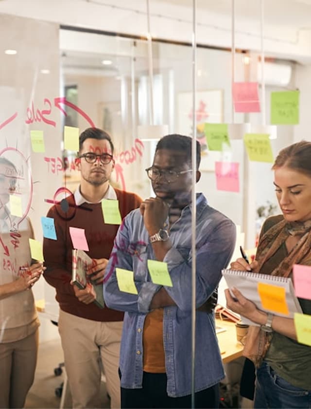 team planning with sticky notes